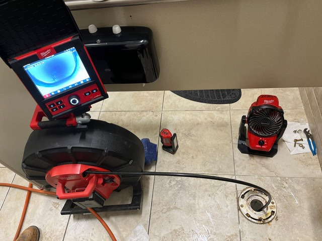 Milwaukee inspection camera and monitor used to find hidden leaks inside walls and pipes